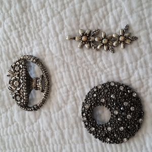 One pin  two necklaces (add your own chain) Antique looking